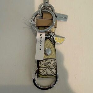 COACH NWT Trigger Snap Bag Charm With Lemon Print